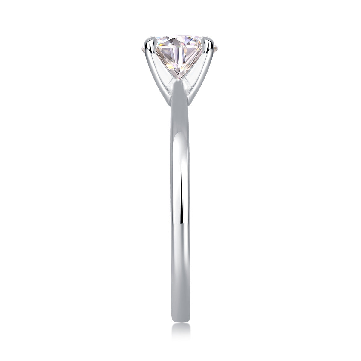 Detail view of Josephine round moissanite engagement ring four-prong setting