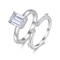 Lotus 3ct emerald-cut moissanite engagement ring in rhodium-plated 925 sterling silver from VANSTELLA